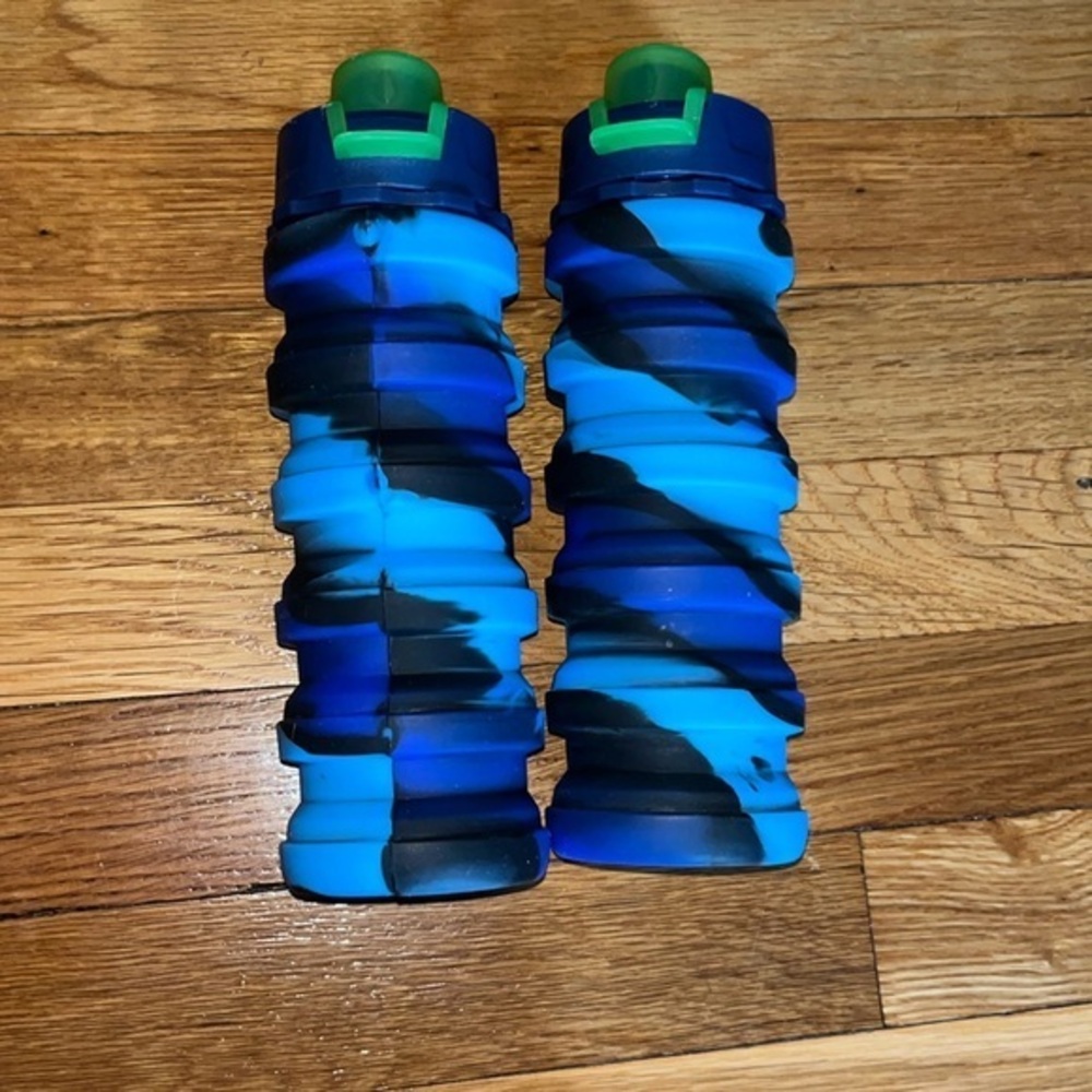 Pair of 2 collapsable blue water bottles with loop for key ring gently used.